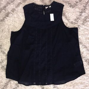 NWT Navy sleeveless lace blouse. Beautiful.